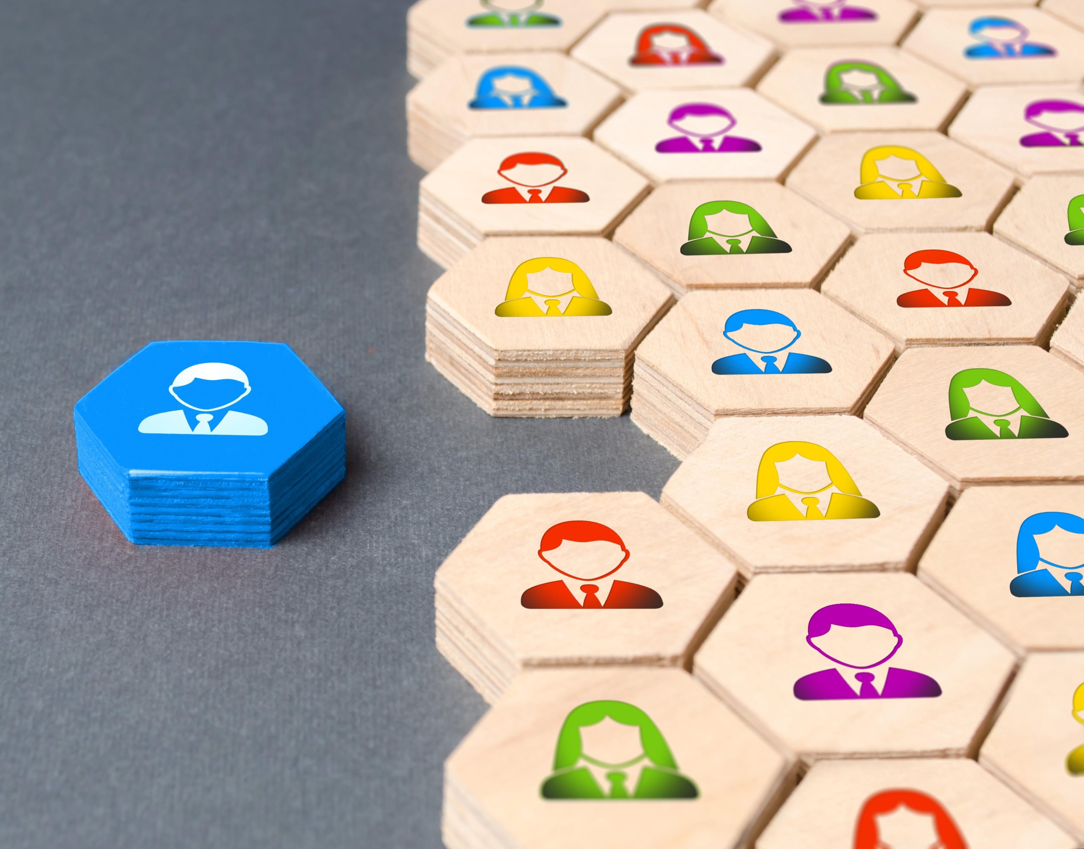 colored tiles with people characters on them one separated